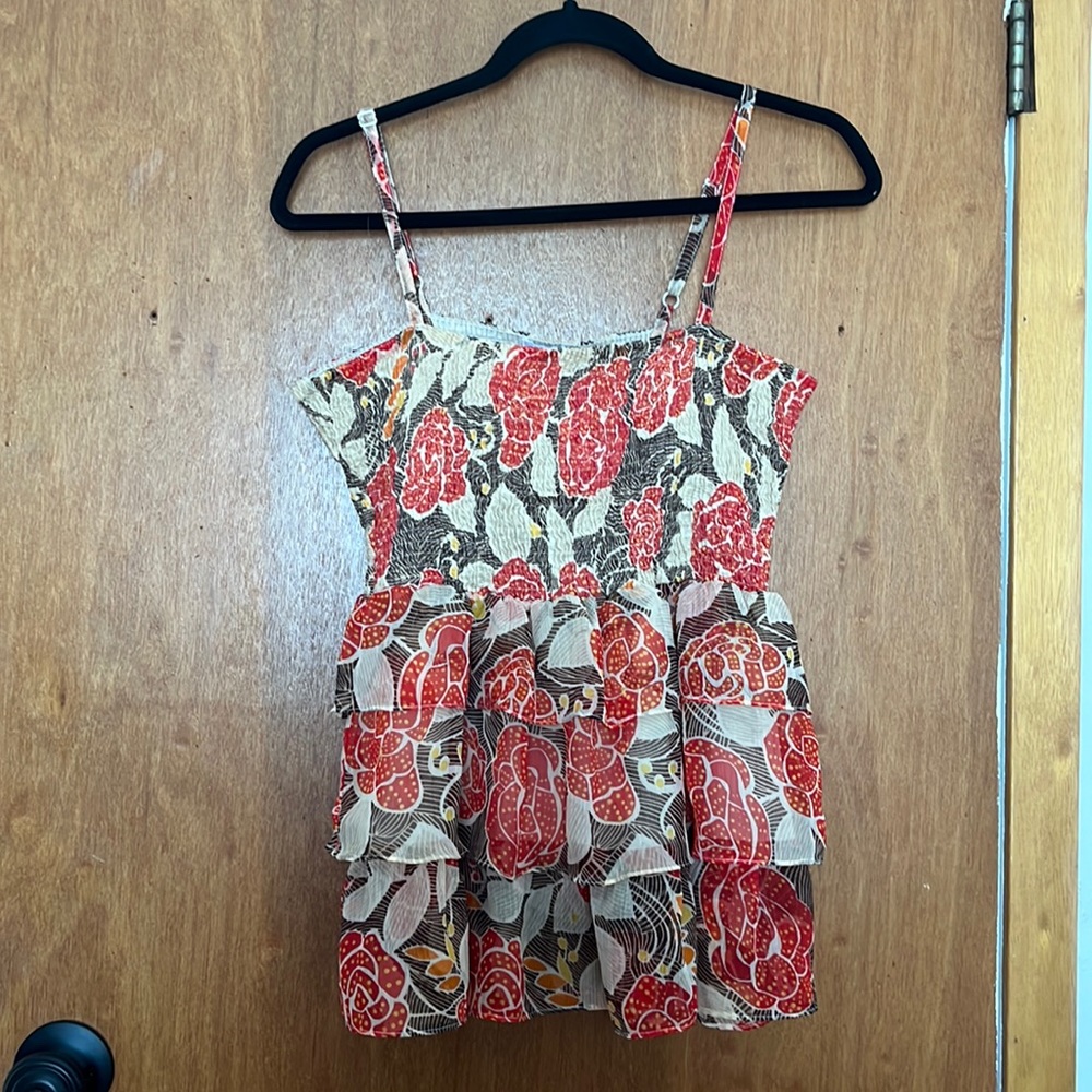 Sleeveless floral top with tiered bottom